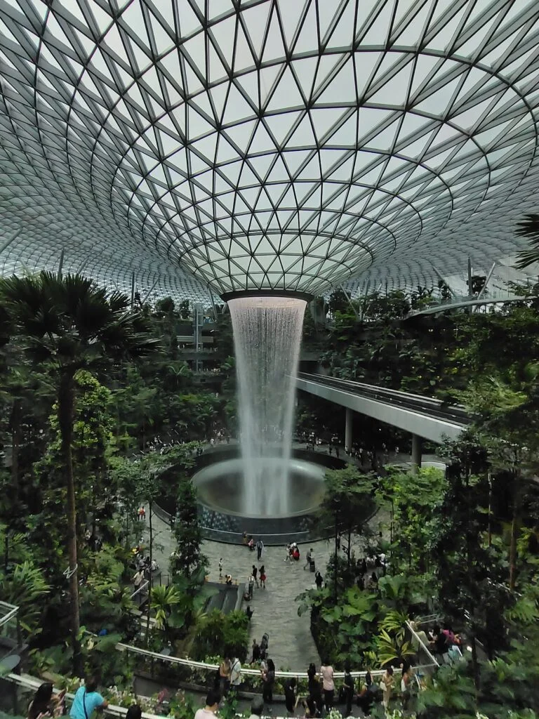 Jewel Changi Airport, Singapore landmark, indoor waterfall, HSBC Rain Vortex, shopping and dining hub, Canopy Park attractions, iconic architecture, Things to do in Singapore, Travel Singapore