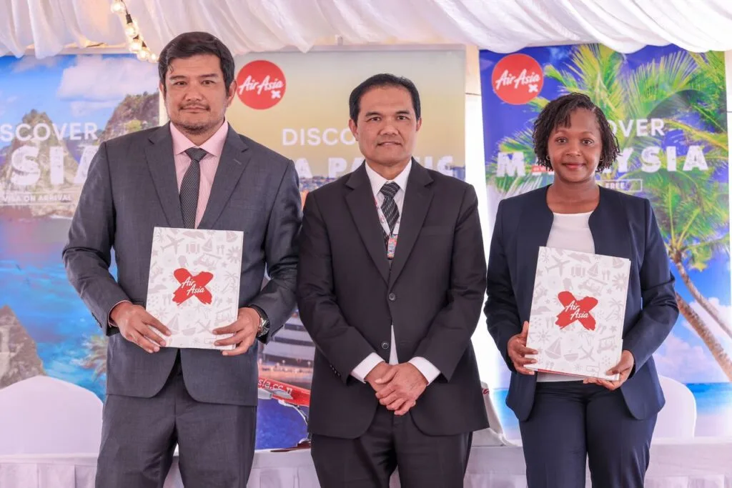 (L-R) Benyamin Ismail, CEO of AirAsia X; H.E. Ruzaimi Mohamad, High Commissioner Permanent Representative of Malaysia to UNEP and UN Habitat; June Chepkemei, CEO of Kenya Tourism Board at the signing ceremony between AirAsia X and Kenya Tourism Board for its Route Marketing Collaboration at the Magical Kenya Expo 2024 held in Nairobi, Kenya.