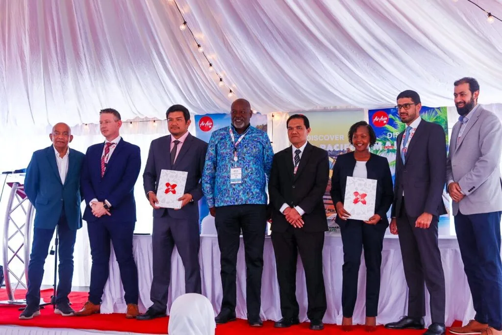 Third from left: Paul Carroll, Chief Commercial Officer of AirAsia Aviation Group; Benyamin Ismail, CEO of AirAsia X; Caleb Kositany, Chairman of Kenya Airport Authority; H.E. Ruzaimi Mohamad, High Commissioner Permanent Representative of Malaysia to UNEP and UN Habitat; June Chepkemei, CEO of Kenya Tourism Board and representatives from AirAsia X’s Official General Sales Agent (GSA) from Magical Aviation Services at the signing ceremony between AAX and KTB for its Route Marketing Collaboration at the Magical Kenya Expo 2024 held in Nairobi, Kenya.