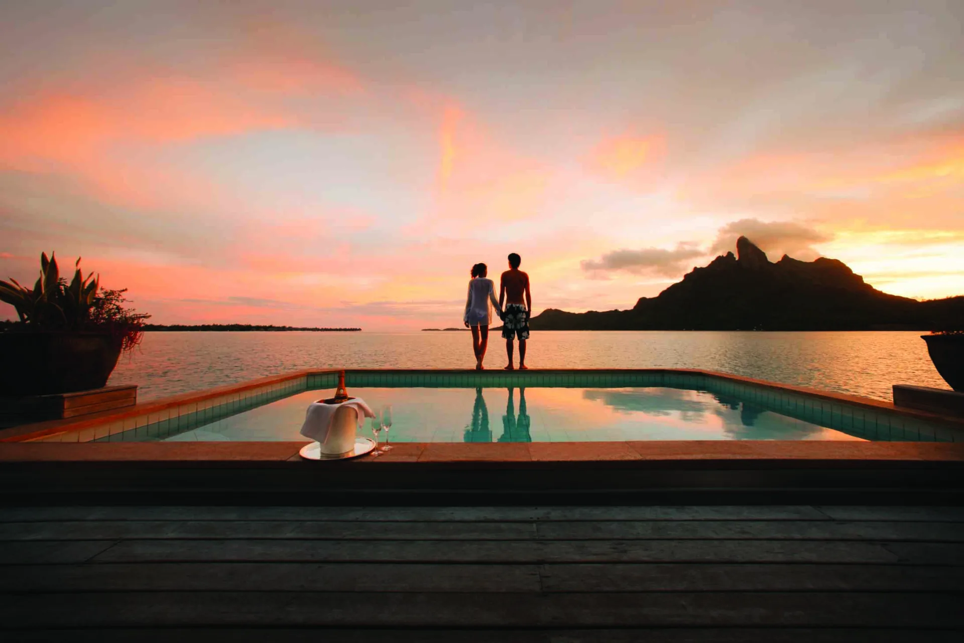 Couples sunset by the pool - Bora Bora