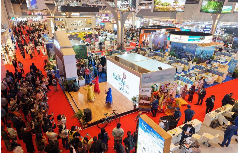 Crowded exhibition with colorful displays.