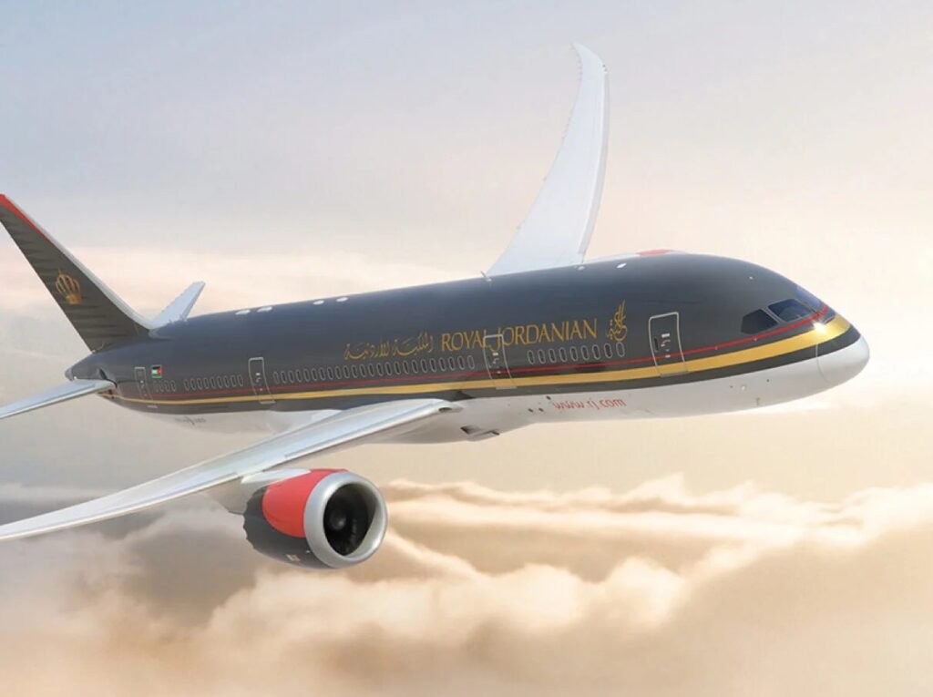 Royal Jordanian airplane flying above clouds