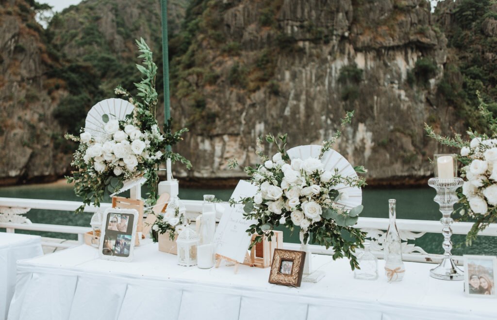Elegant wedding setup on a boat. Wedding Bhaya Cruises Decoration. Destination Wedding in Ha Long Bay: Say “I Do” with Bhaya Cruises in Vietnam