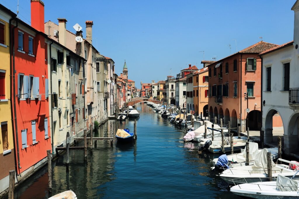 7 Cities in Italy to Visit If You’re Sick of Venice Crowds - Chioggia Venetian Canals
