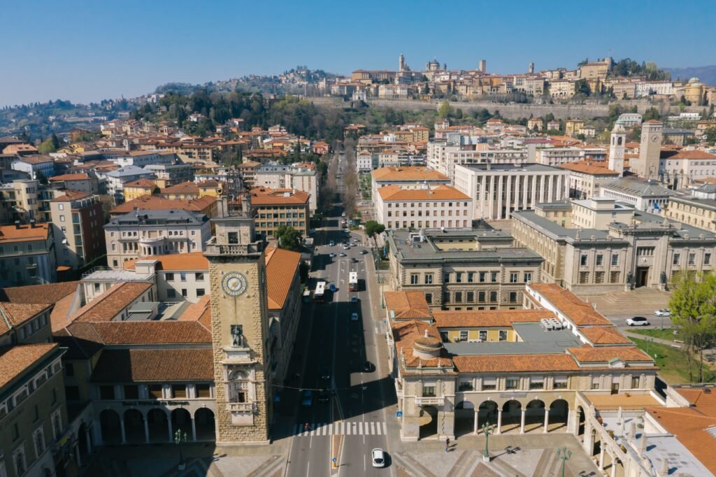 7 Cities in Italy to Visit If You’re Sick of Venice Crowds - Campanone civic bell tower aerial view of Bergamo