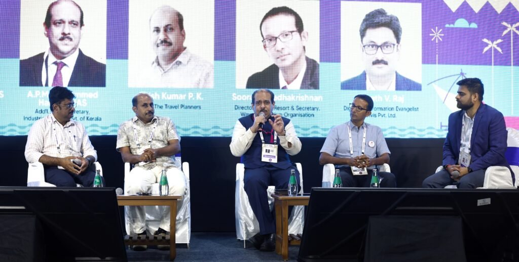 APM Mohammed Haneesh, Additional Chief Secretary, Industries Department, speaking at panel discussion on ‘Digital Agenda and AI to redesign tourism’ at Kerala Travel Mart (KTM) 2026 in Kochi on Sunday. Also seen are:  Sumit Kumar Thakur, MD, KTDC and ADG, Kerala Tourism; Anish Kumar, CEO, The Travel Planners; Soorajith Radhakrishnan, Secretary, Wayanad Tourism Organisation; and Digital Evangelist Sarath V. Raj.